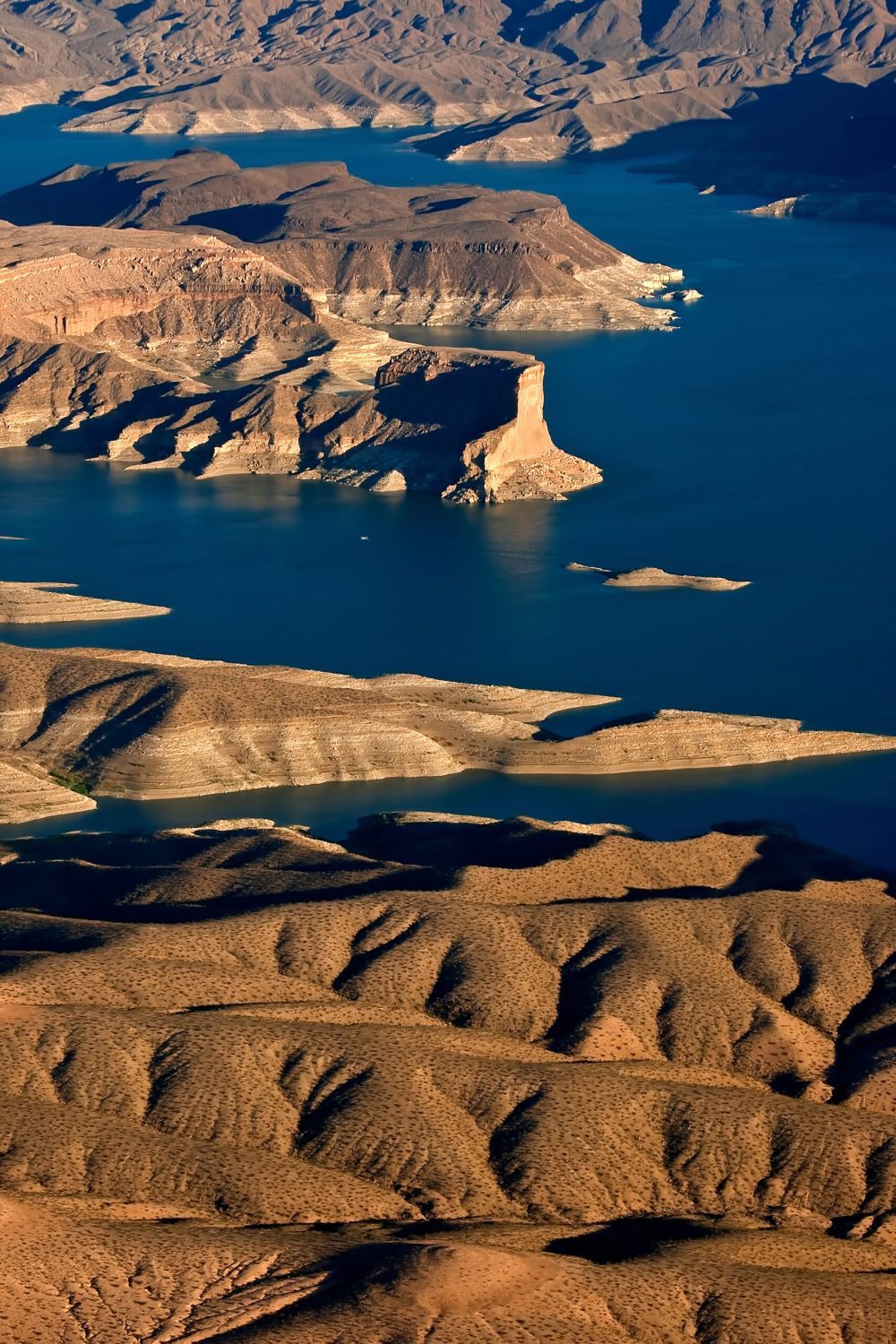 aerial-view-island-scaled-rahobd2q8naos1fzegu5665qh9zzxvebe33uq9v0d4